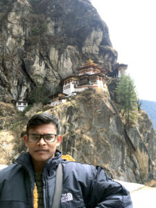 Md Tariqul Islam in front of Tiger's Nest while visiting Bhutan.