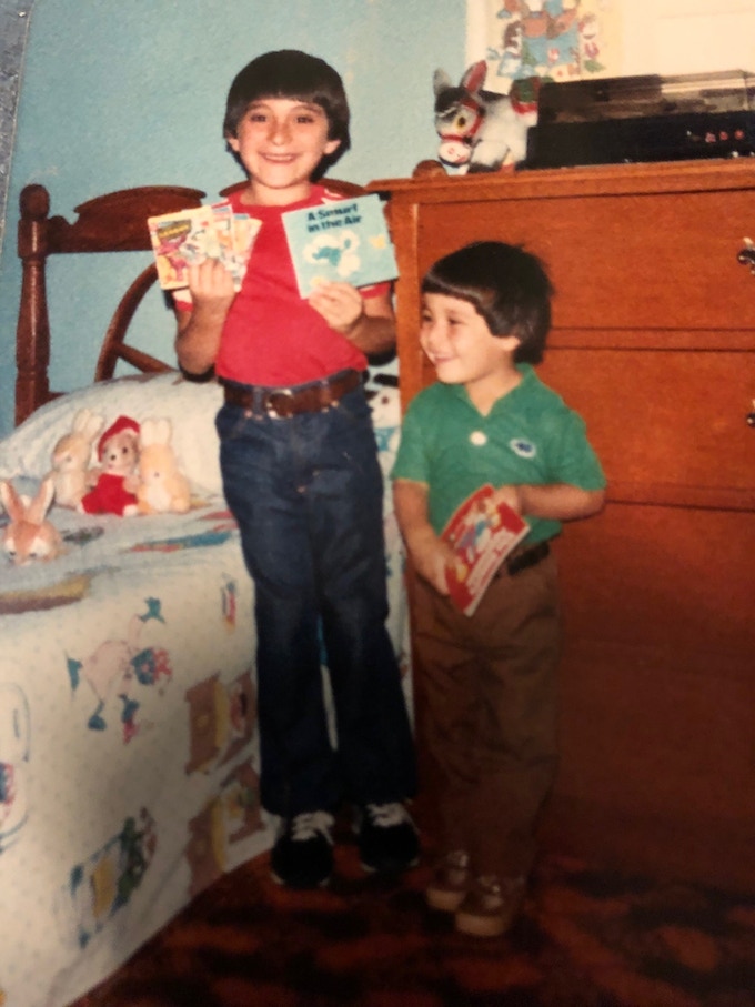 Manuel with his younger brother, Chico, proudly presenting our first book and comic collection. This project was decades in the making...